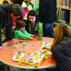 kids playing games at manchester community library